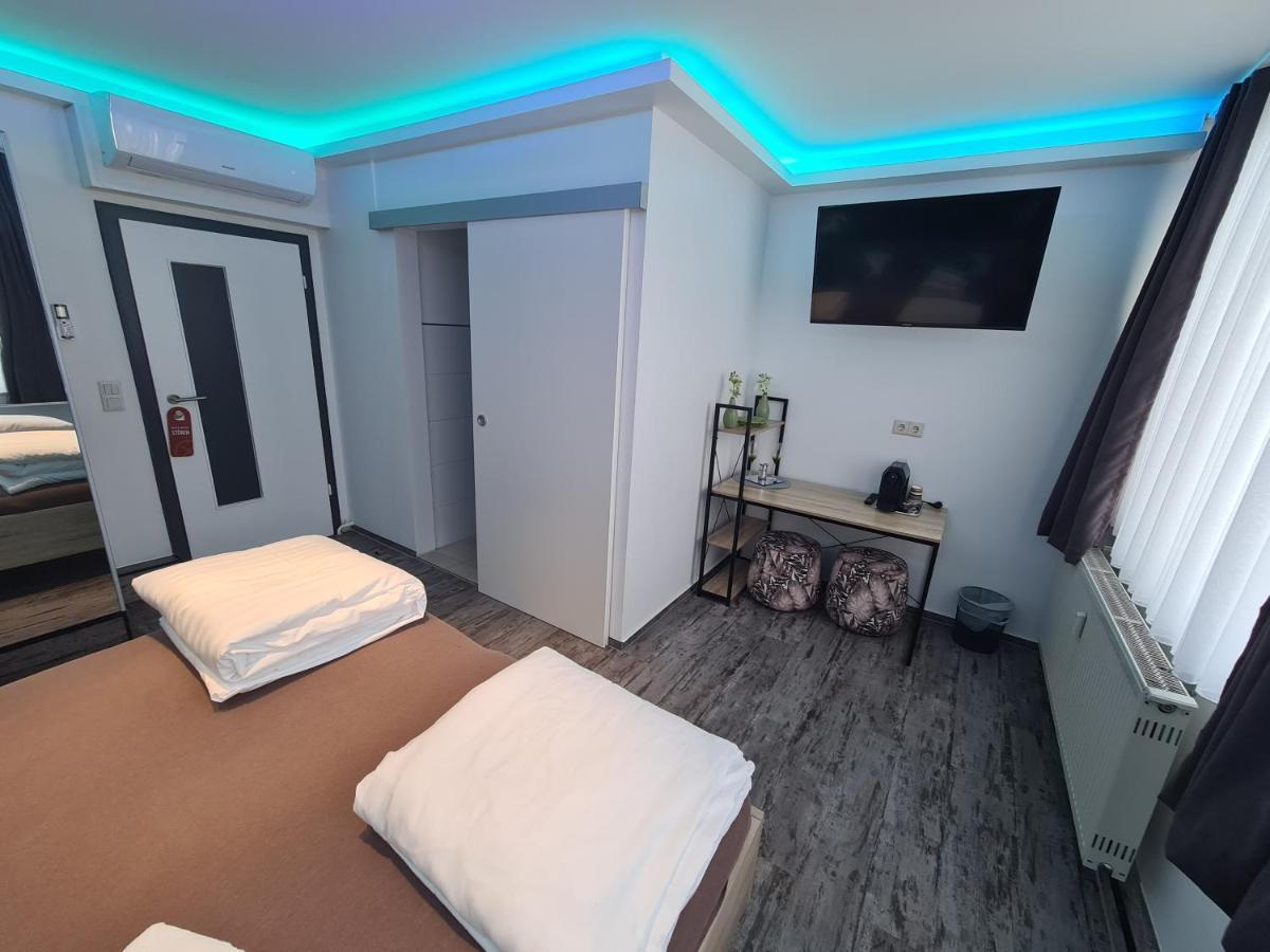 Pension Zwei A เลเวอร์คูเซน ภายนอก รูปภาพ